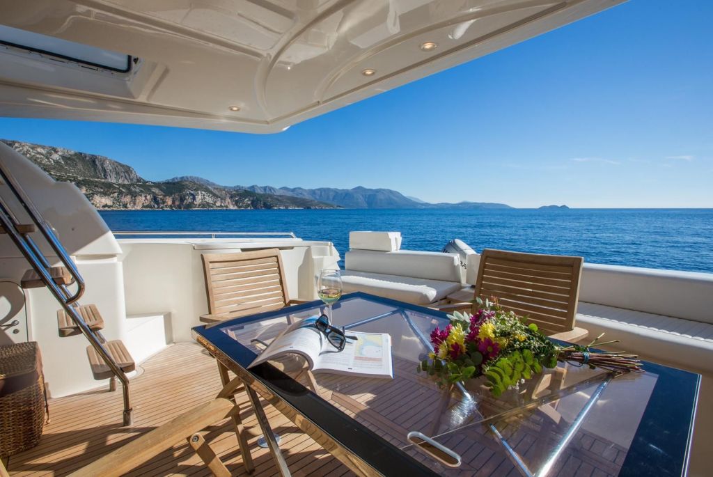 Spacious and elegantly designed dining area aboard the Ferretti 591 yacht